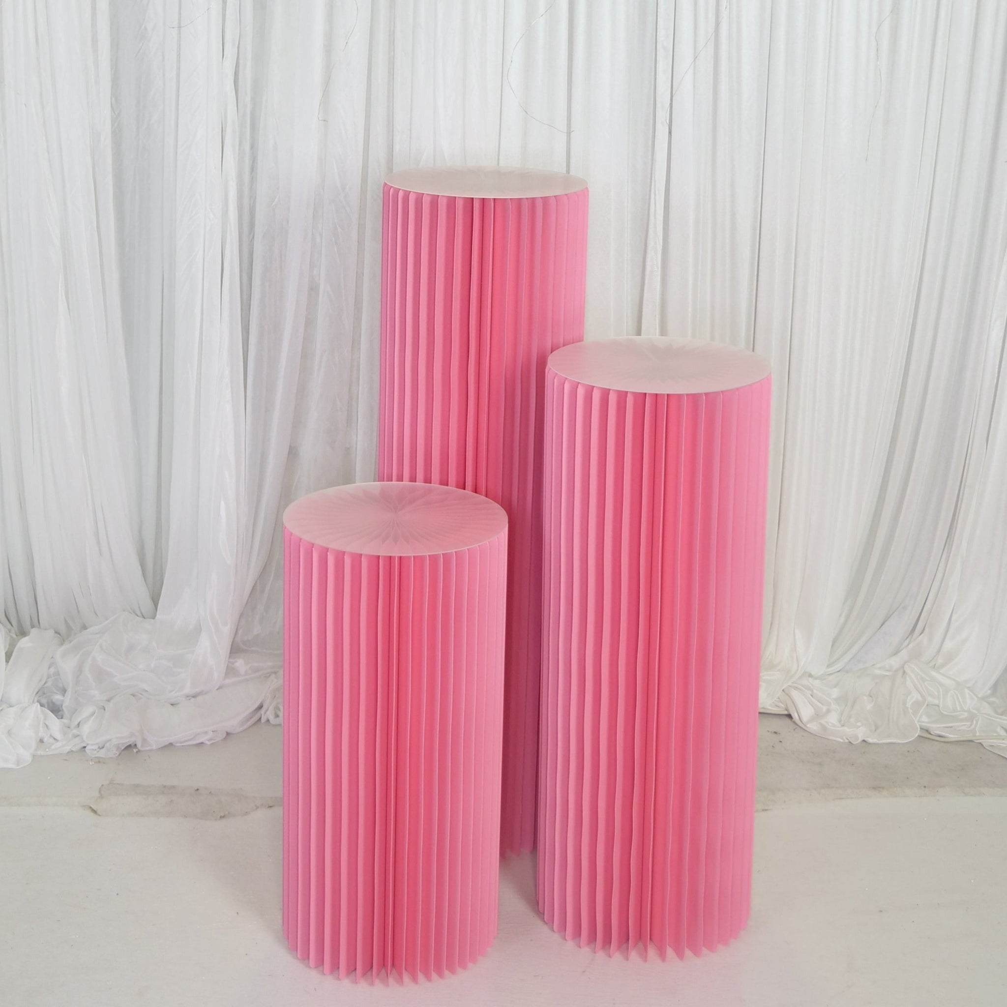 Location - Colonnes cylindriques pliables couleur rose par 3